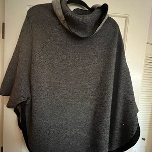 Adorable black and off white cowl neck poncho.  Great for layering and leggings!